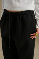 BLACK AIRPORT KNIT TROUSERS