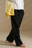 BLACK AIRPORT KNIT TROUSERS