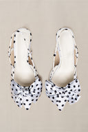 WHITE PEBBLE DOT HEELS