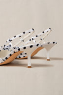 WHITE PEBBLE DOT HEELS